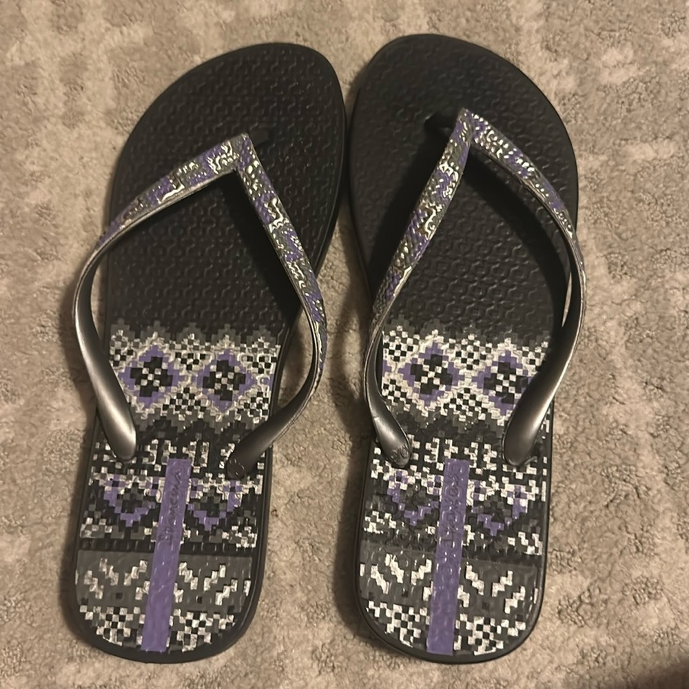 Purple silver and black flip flops barley worn